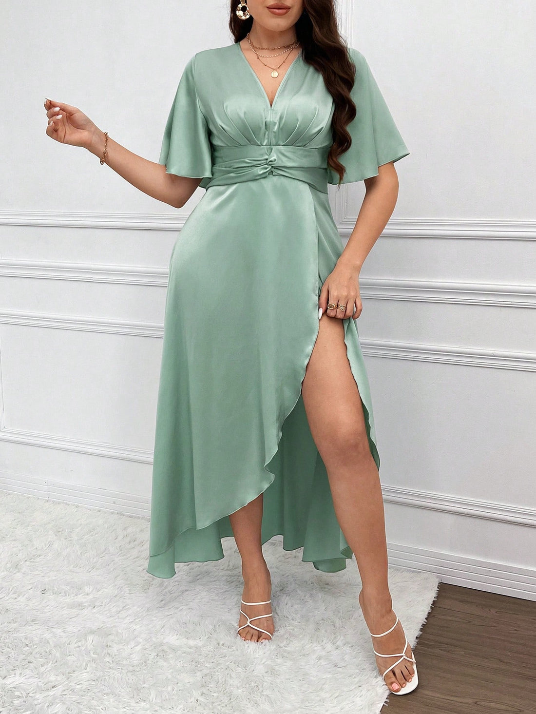 Embrace your curves and feel confident in our Chic & Elegant Plus Size V-Neck High Split Dress. With a flattering v-neckline and high split design, this dress will showcase your figure in all the right ways. The flare sleeves add a touch of elegance, making this dress perfect for any formal occasion.