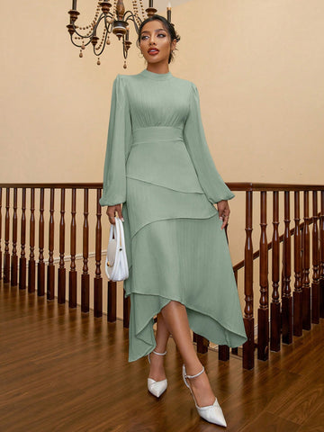 The Chic & Elegant Women's Dress features a stand collar and lantern sleeves, exuding sophistication and class. Its long sleeves provide both comfort and style, making it the perfect dress for any occasion. Elevate your wardrobe with this stylish and timeless piece.