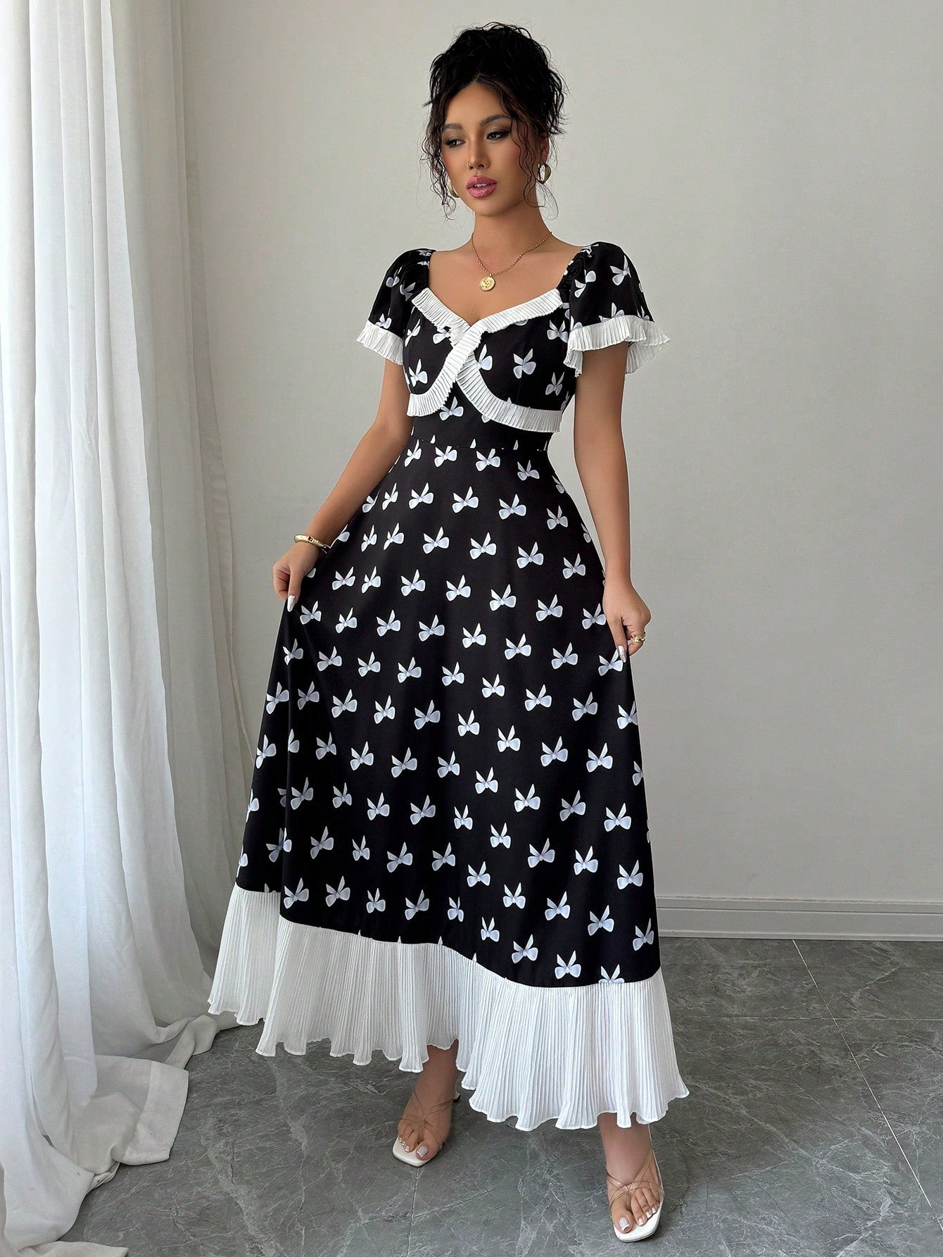 Make a statement in our Elenzga Pleated Ruffle Collar Swing Dress! This sassy number features eye-catching contrasting colors and a playful ruffle collar that's sure to turn heads. The flattering swing silhouette dances with your every move, while pleated details add a touch of whimsy. Dress it up or down—this versatile piece is ready to be your go-to for brunches, parties, or wherever your fabulous life takes you!