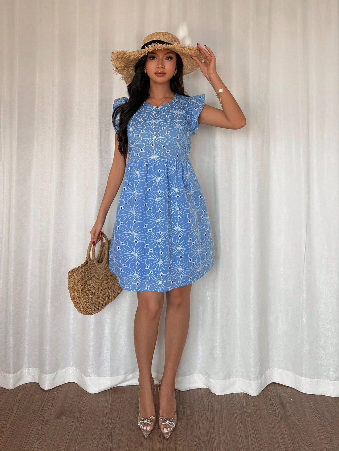 Get ready to turn heads in this chic embroidered jacquard mini dress! Featuring intricate detailing and a playful ruffle trim, this dress is perfect for casual spring and summer vacations. You'll feel effortlessly stylish and comfortable while making a statement. Add this unique piece to your wardrobe now!