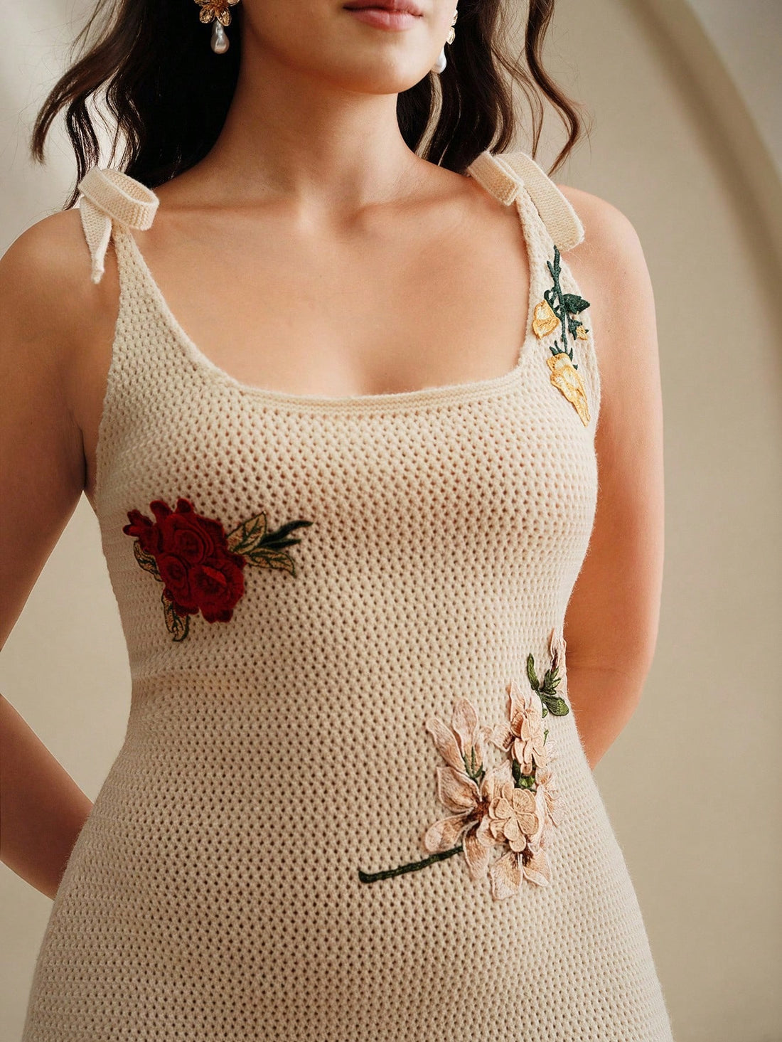 Step into cozy elegance with our Chic Embroidered Knit Camisole Dress. Delicately embroidered and crafted from soft knit fabric, this dress keeps you warm while turning heads during chilly fall and winter days. Its playful design pairs perfectly with your favorite layers, making it a go-to piece for stylish comfort all season long.