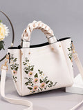 This embroidered shoulder bag is the perfect Mother's Day gift for fashionable moms. Its chic design will elevate any outfit, while the spacious interior and multiple pockets make it practical for everyday use. Show your mom how much you appreciate her with this stylish and functional bag.