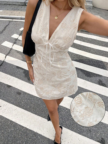 Step into style with this Chic Embroidered Sleeveless Mini Dress—your new go-to for both holiday fun and business casual flair. Lightweight and breezy, its delicate embroidery adds just the right touch of charm, making it perfect for turning heads from daytime meetings to evening celebrations. Effortless to wear and easy to love, this dress blends playful elegance with versatile comfort.