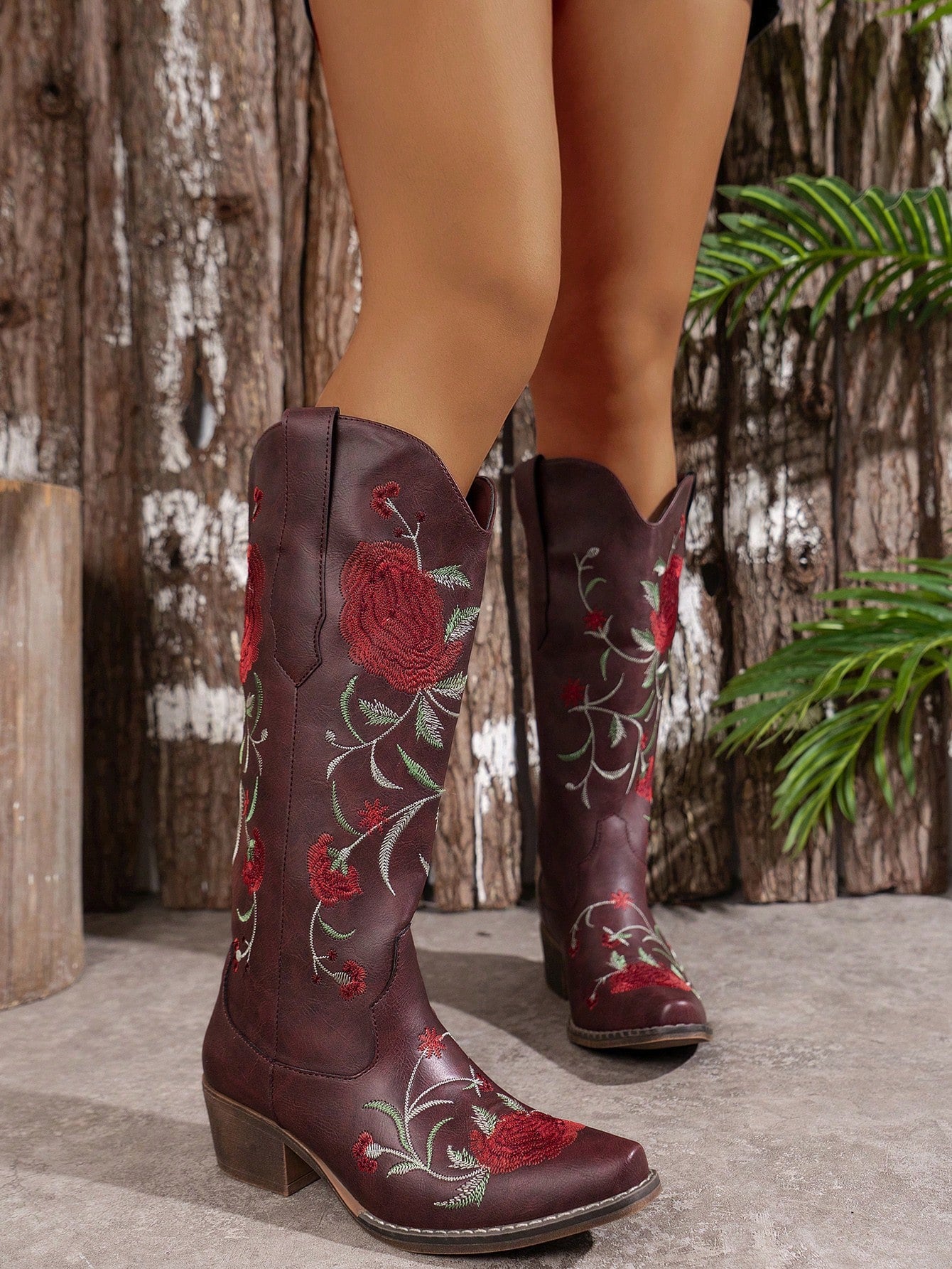 Elevate your style with our Chic Embroidered Wedge Slip-On Boots! Perfect for any occasion, these versatile boots feature stunning embroidery and a comfortable wedge heel. Step out in style and make a statement with these solid-colored footwear that will take your look to the next level.