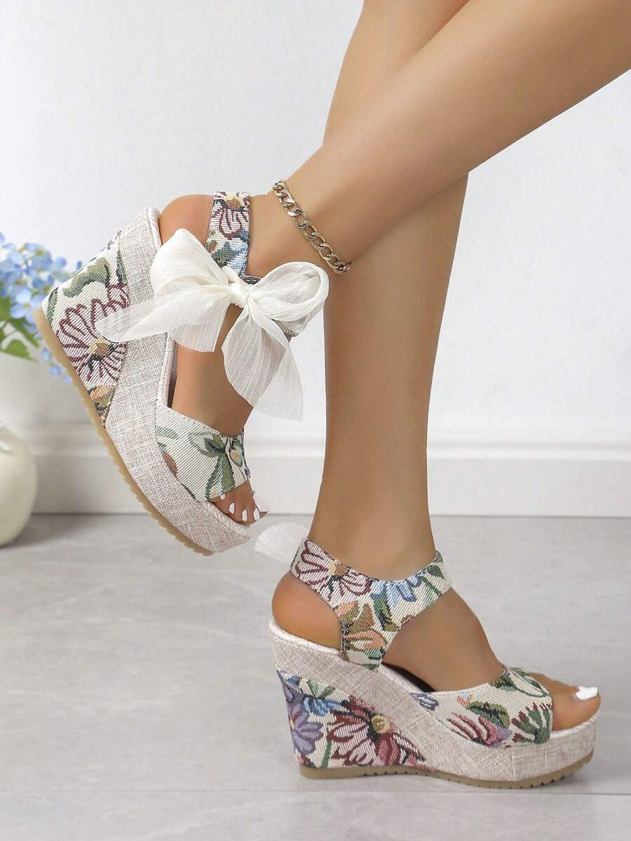 Elevate your warm-weather wardrobe with these charming European-inspired platform wedge sandals. Featuring a delicate ribbon bow detail and open peep-toe design, they blend bohemian elegance with everyday comfort. The canvas upper and PU leather lining provide breathable support, while the TPR outsole ensures reliable traction on any surface. True-to-size fit in a sophisticated mint green hue. Perfect for beach days, casual outings, weddings, or festive occasions