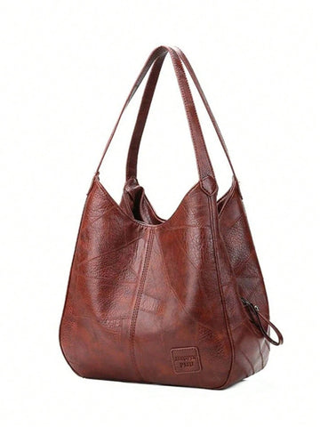 Elevate your everyday carry with this fabulous faux leather bucket tote—the perfect blend of style and practicality. Its spacious interior keeps all your essentials organized, while the secure zipper closure ensures nothing goes missing during your adventures. The sleek shoulder straps make it effortless to carry, whether you're heading to brunch, the office, or weekend getaways. With its chic silhouette and versatile design, this tote pairs seamlessly with any outfit. Who says functional can't be fashionab