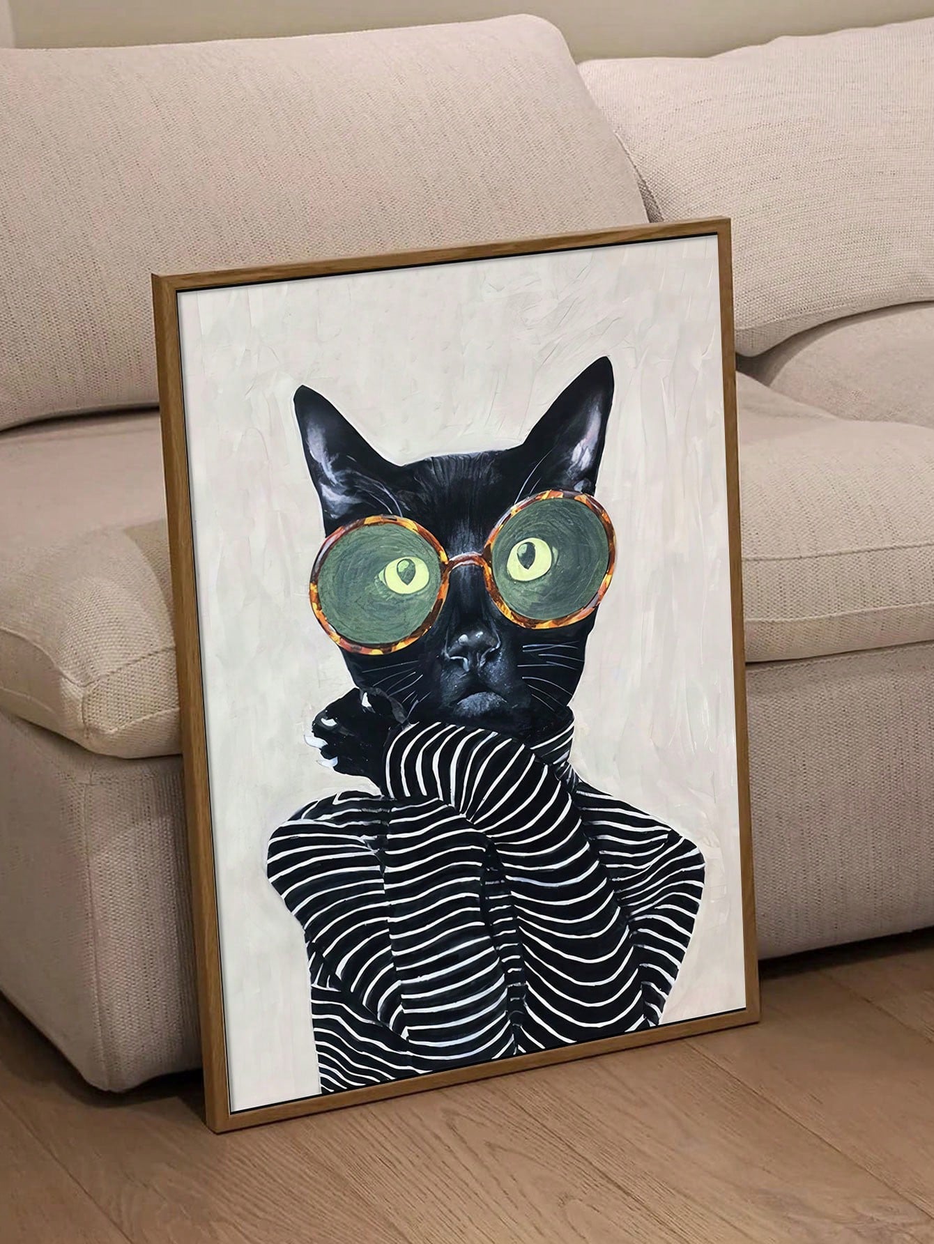 Elevate your home decor with our Chic Feline Fashion Canvas Art featuring a stylish cat in a striped shirt and round glasses. Made with premium canvas material, this wall decor adds a touch of sophistication and charm to any room. A must-have for cat lovers and fashion enthusiasts alike.