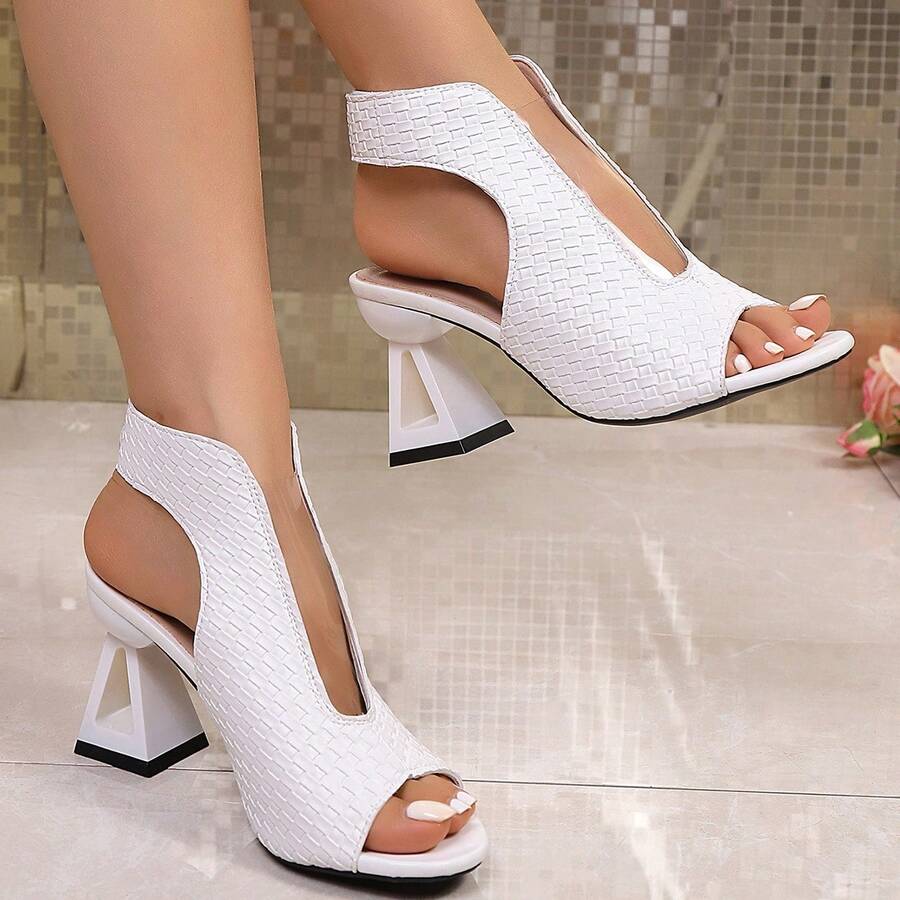 Elevate your summer wardrobe with these sophisticated fish mouth high-heeled sandals, inspired by classic Roman design. Crafted for the modern woman who values both style and comfort, these sandals feature an open-toe silhouette that flatters any pedicure while the elevated heel adds instant elegance to casual and dressy occasions alike. The thoughtfully designed arch support and cushioned footbed ensure all-day wearability, whether you're navigating city streets or attending outdoor events. Perfect for pai