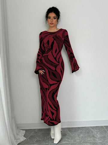 Elevate your style effortlessly with our Chic Flared Sleeve Graphic Sweater Dress. Crafted with a stylish graphic design and flared sleeves, this dress adds a touch of sophistication to any outfit. Made with quality materials, it offers both comfort and style in one.