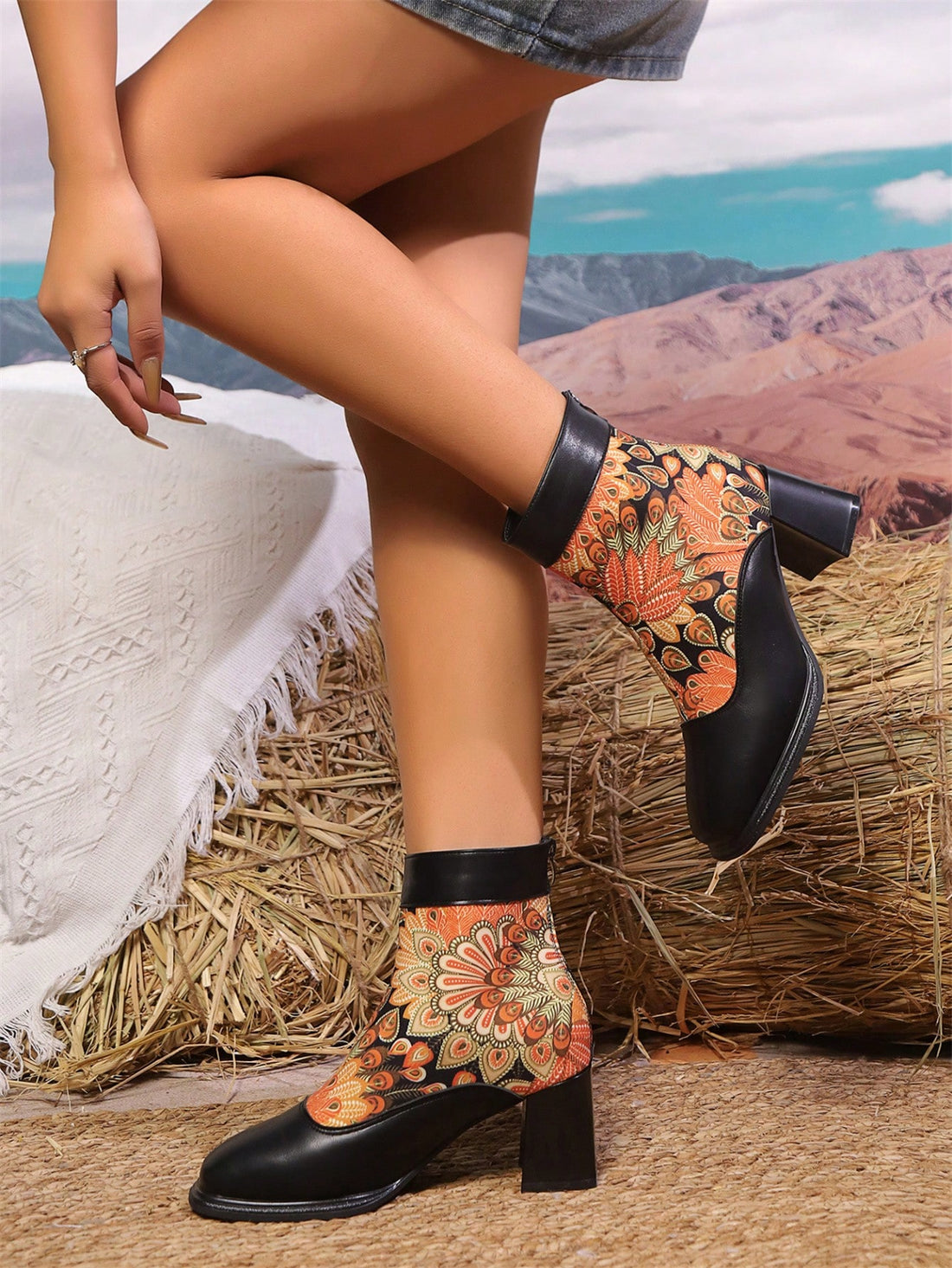 Elevate your autumn-winter wardrobe with our Chic Flock Embroidered Chunky Heel Boots. The luxurious embroidery adds a touch of elegance to any outfit, while the chunky heel provides both style and support. Perfect for completing a stylish and confident look, these boots are a must-have for any fashion-forward individual.