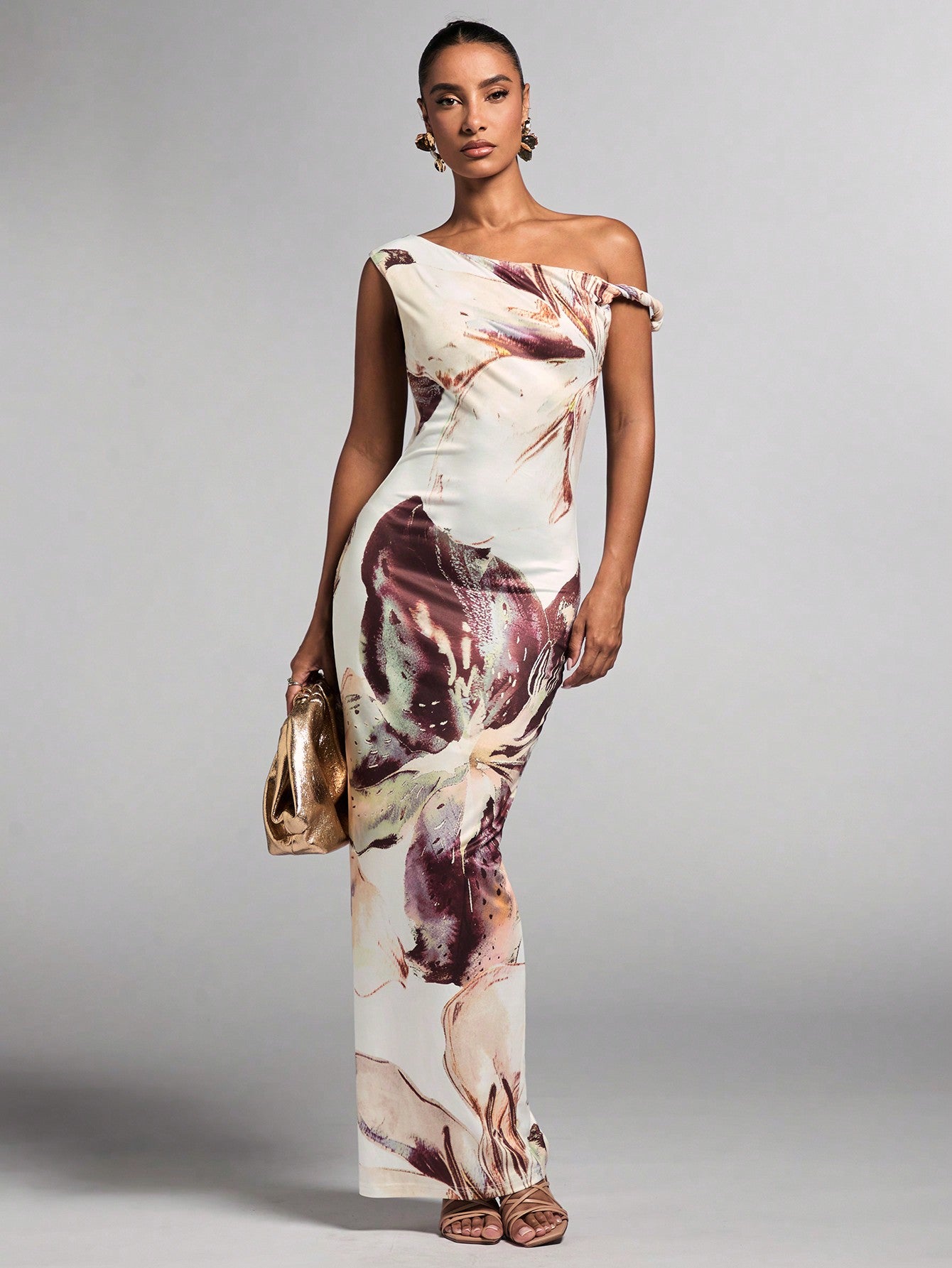 Brighten up your summer wardrobe with our Chic Floral Asymmetric Bodycon Dress! Perfect for your next vacation, this dress will make you feel stylish and confident while keeping you cool and comfortable. Its unique and playful design is sure to turn heads. Don't miss out on this must-have piece!