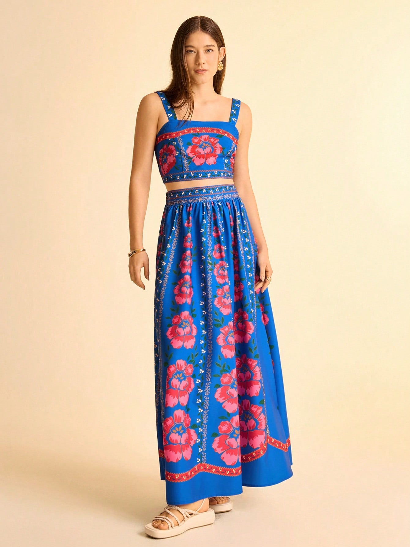 Escape to your best self in this effortless floral set that screams vacation vibes. The delicate cami top pairs perfectly with the flowing skirt, creating an outfit that's equal parts romantic and ready-for-anything. Whether you're sipping cocktails by the pool or exploring a charming coastal town, this boho-inspired duo keeps you looking fresh and feeling fabulous. Mix it, match it, or wear it as the complete package—either way, you're giving main character energy. Perfect for getaways, garden parties, or 