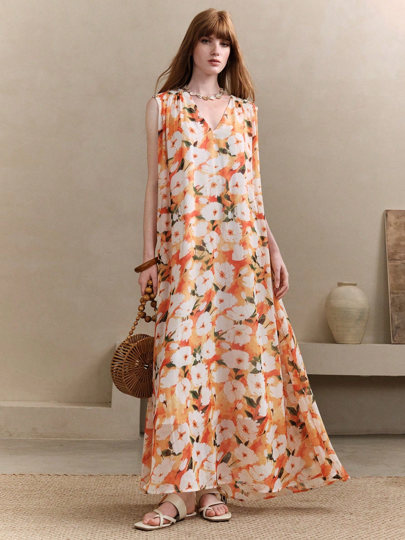 Step into sunshine and smiles with this Chic Floral Chiffon Maxi Dress. Its breezy chiffon fabric and flattering V-neck sleeveless design keep you cool and stylish, perfect for summer vacations or dancing the night away at weddings. The flowing A-line silhouette adds a touch of effortless elegance, making every moment feel like a celebration.