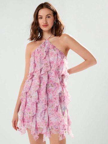 Turn heads with this chic floral halter dress! The draped ruffle design adds a playful touch to the perfect summer fashion piece. Stay stylish and comfortable all season long.