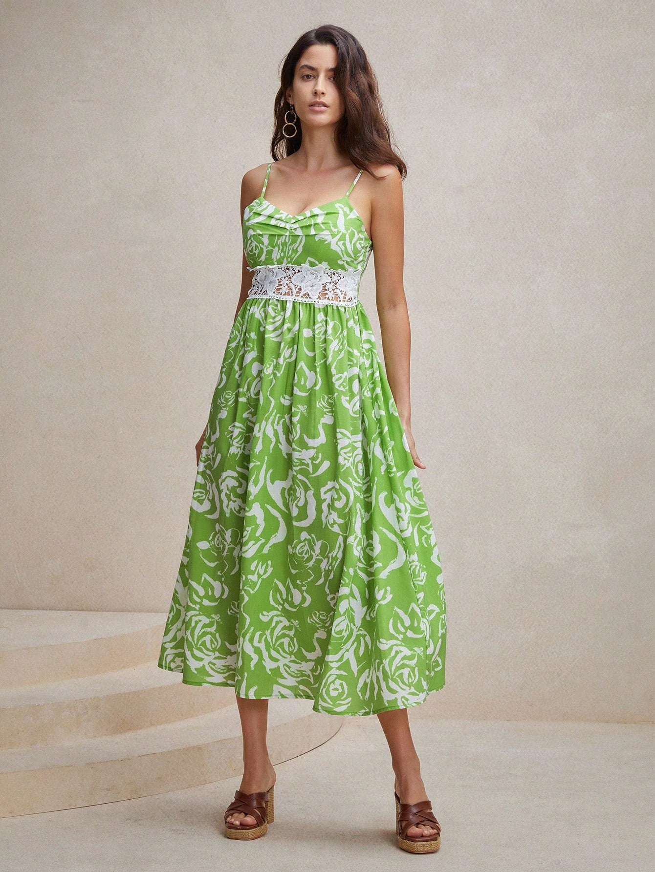 Stay cool and stylish this summer with our Chic Floral Dreams dress! Made for women, this green spaghetti strap dress features delicate lace details for a touch of elegance. Perfect for any occasion, from picnics to date nights, this dress will make your summer dreams come true.