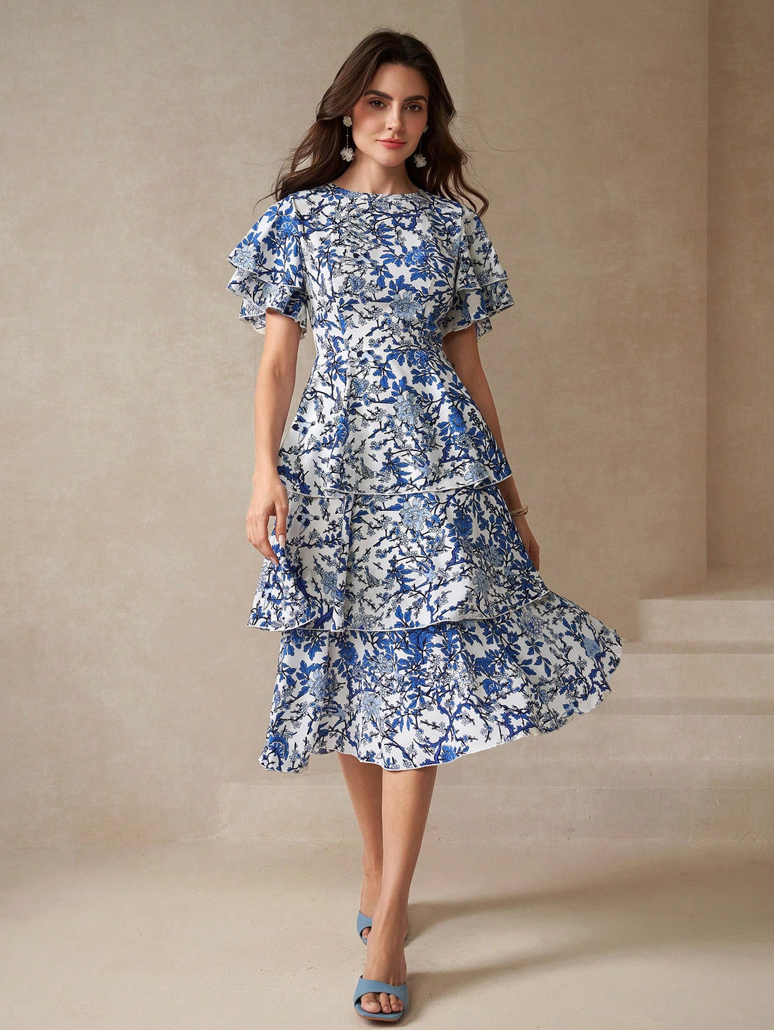 Step into sunshine with this Chic Floral Dress featuring fluttery butterfly sleeves and a playful layered hem. Its breezy design brings effortless style and a touch of whimsy to any day, making it your go-to for twirling through warm-weather adventures.