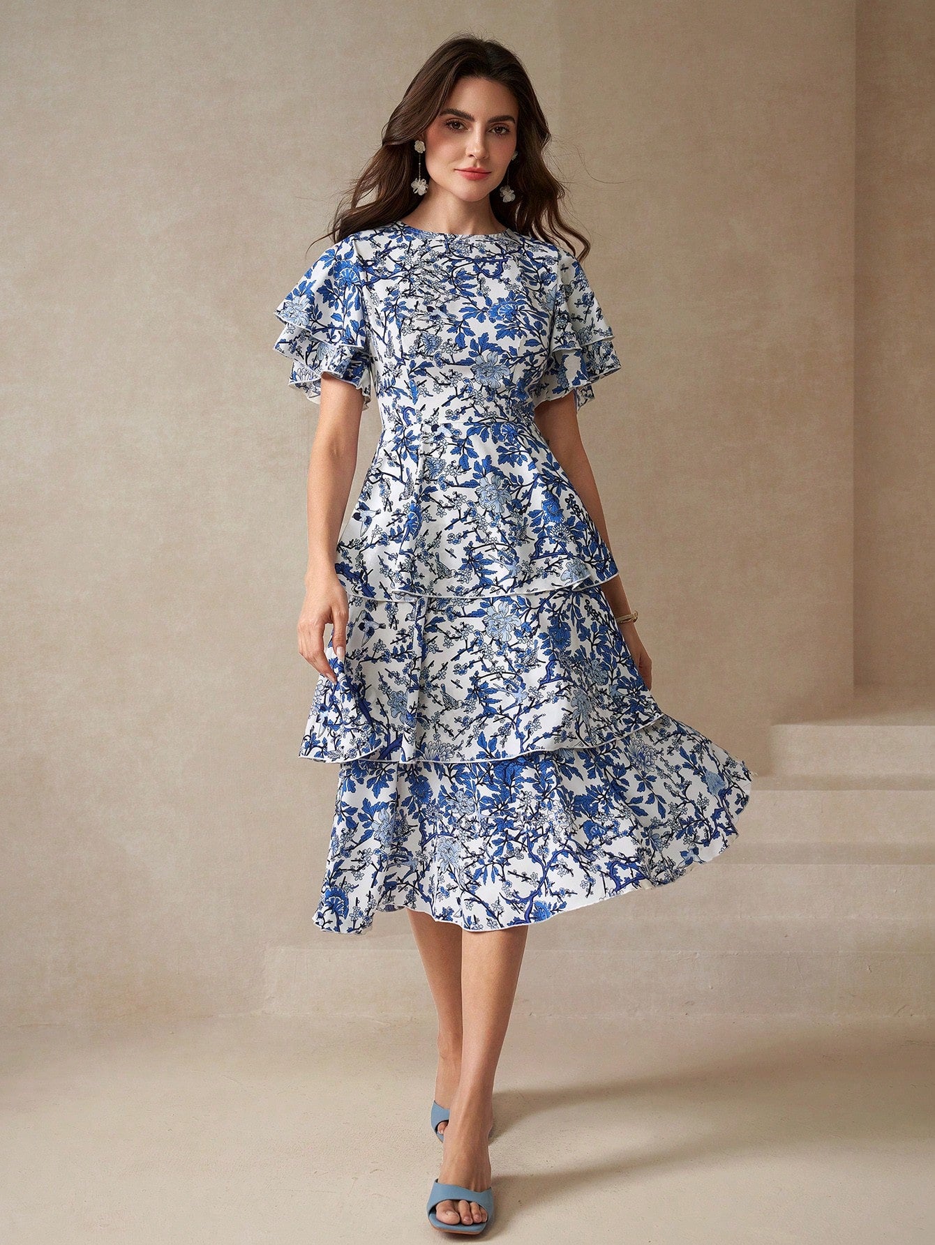 Step into sunshine with this Chic Floral Dress featuring fluttery butterfly sleeves and a playful layered hem. Its breezy design brings effortless style and a touch of whimsy to any day, making it your go-to for twirling through warm-weather adventures.