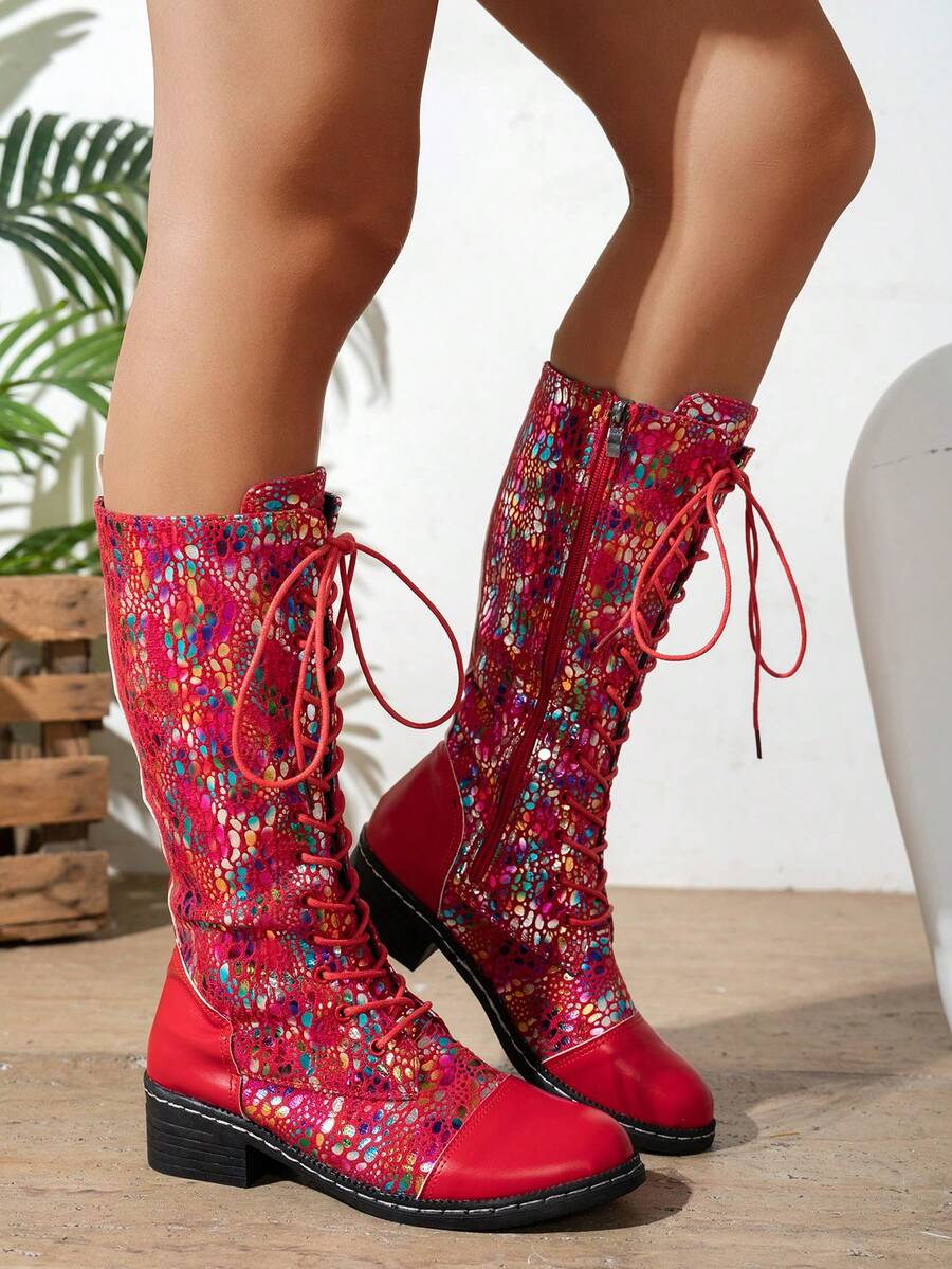 Step into style with these charming floral embroidered mid-calf boots! Featuring a playful lace-up design and sturdy chunky heel, they're the perfect blend of fashion and function. The intricate floral details add a whimsical touch to any outfit, while the comfortable fit keeps you feeling fabulous all day long. Whether you're dressing up for a night out or adding personality to your everyday look, these boots deliver both flair and wearability. A versatile wardrobe essential that celebrates your unique sty