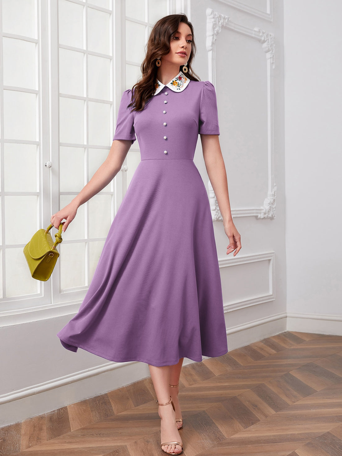 Add a touch of playful charm to your wardrobe with our Chic Floral Embroidery Contrast Collar Dress in Lilac Purple. The delicate embroidery and contrasting collar add a touch of quirkiness to this chic dress, perfect for any occasion. (Seriously, though, it's the cutest dress ever!)