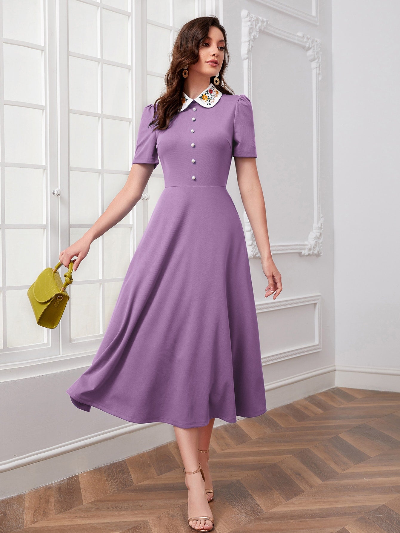 Add a touch of playful charm to your wardrobe with our Chic Floral Embroidery Contrast Collar Dress in Lilac Purple. The delicate embroidery and contrasting collar add a touch of quirkiness to this chic dress, perfect for any occasion. (Seriously, though, it's the cutest dress ever!)