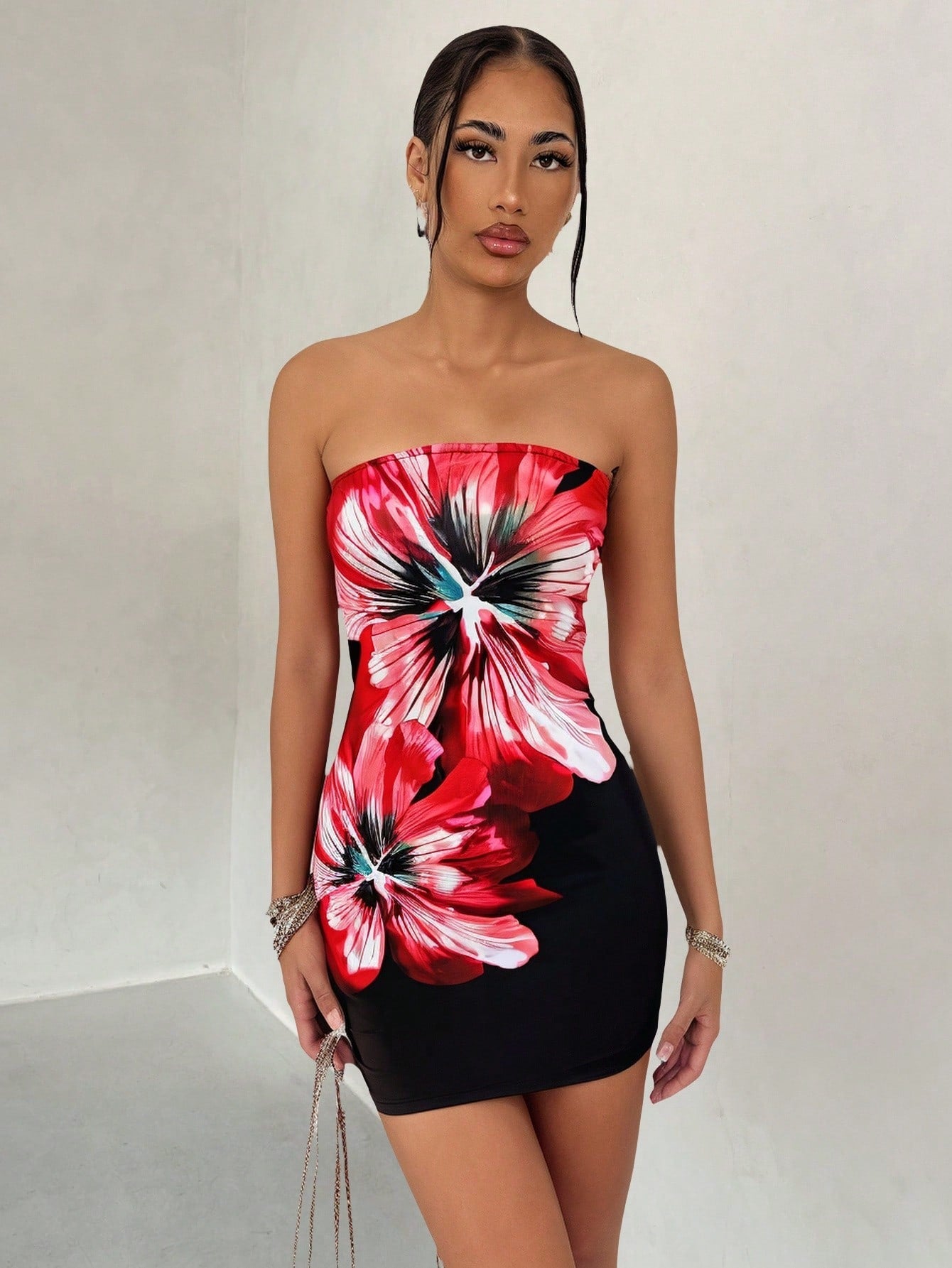 Elevate your style with our Chic Floral Fitted Bustier Dress. Its elegant design is perfect for any occasion. Embrace the playful side of fashion with this unique and eye-catching piece.