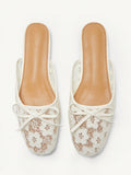 Step into elegance with these charming Mary Jane flats, where delicate floral lace meets timeless style. The sweet bow accent adds a playful touch perfect for spring strolls or holiday celebrations. Designed for all-day comfort, these versatile flats transition seamlessly from casual outings to special occasions. Whether you're dressing up a sundress or pairing with your favorite jeans, these beauties bring a dash of feminine flair to any wardrobe. A must-have for anyone who loves classic style with a moder