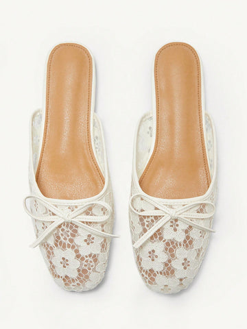 Step into elegance with these charming Mary Jane flats, where delicate floral lace meets timeless style. The sweet bow accent adds a playful touch perfect for spring strolls or holiday celebrations. Designed for all-day comfort, these versatile flats transition seamlessly from casual outings to special occasions. Whether you're dressing up a sundress or pairing with your favorite jeans, these beauties bring a dash of feminine flair to any wardrobe. A must-have for anyone who loves classic style with a moder