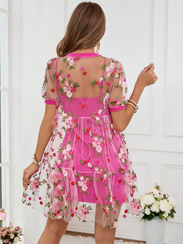Effortlessly elegant never looked so good! This Chic Floral Mesh Dress adds a touch of whimsy to your everyday wardrobe. Featuring delicate floral mesh and a flattering fit, this dress is perfect for any occasion. Feel stylish and carefree with every wear.