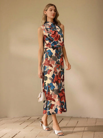 Be the center of attention in our Chic Floral Midi Dress from the Elegant Clasi Collection. With its stunning floral design, this dress is perfect for any occasion. Add a touch of elegance to your wardrobe and turn heads wherever you go. (Get ready to be the talk of the town!)