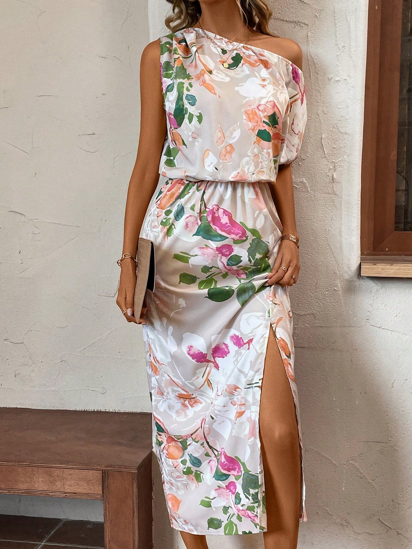 Elevate your summer wardrobe with our Chic Floral One-Shoulder Split Thigh Dress. The one-shoulder design and thigh-high split give a trendy touch, while the flowy fabric and vibrant floral print exude elegance. Perfect for any summer occasion, this dress is sure to turn heads and make you feel stylish and confident.