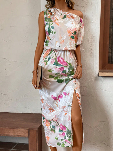 Elevate your summer wardrobe with our Chic Floral One-Shoulder Split Thigh Dress. The one-shoulder design and thigh-high split give a trendy touch, while the flowy fabric and vibrant floral print exude elegance. Perfect for any summer occasion, this dress is sure to turn heads and make you feel stylish and confident.