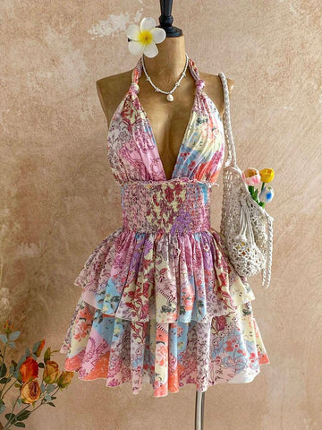 Embrace effortless elegance with this stunning floral midi dress, designed for those who love bohemian charm. The delicate pleated silhouette creates graceful movement, while the distinctive bow halter neckline adds a touch of sophistication. Perfect for summer getaways, beach days, or casual garden parties, this dress transitions seamlessly from day to evening. The vibrant floral print captures the essence of carefree style, making it an essential piece for your warm-weather wardrobe. 