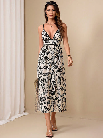 Effortlessly upgrade your vacation style with this plunging V-neck sleeveless dress. With a chic floral design, this dress is perfect for showing off your playful and fun side. Don't miss out on this wardrobe essential for any getaway!