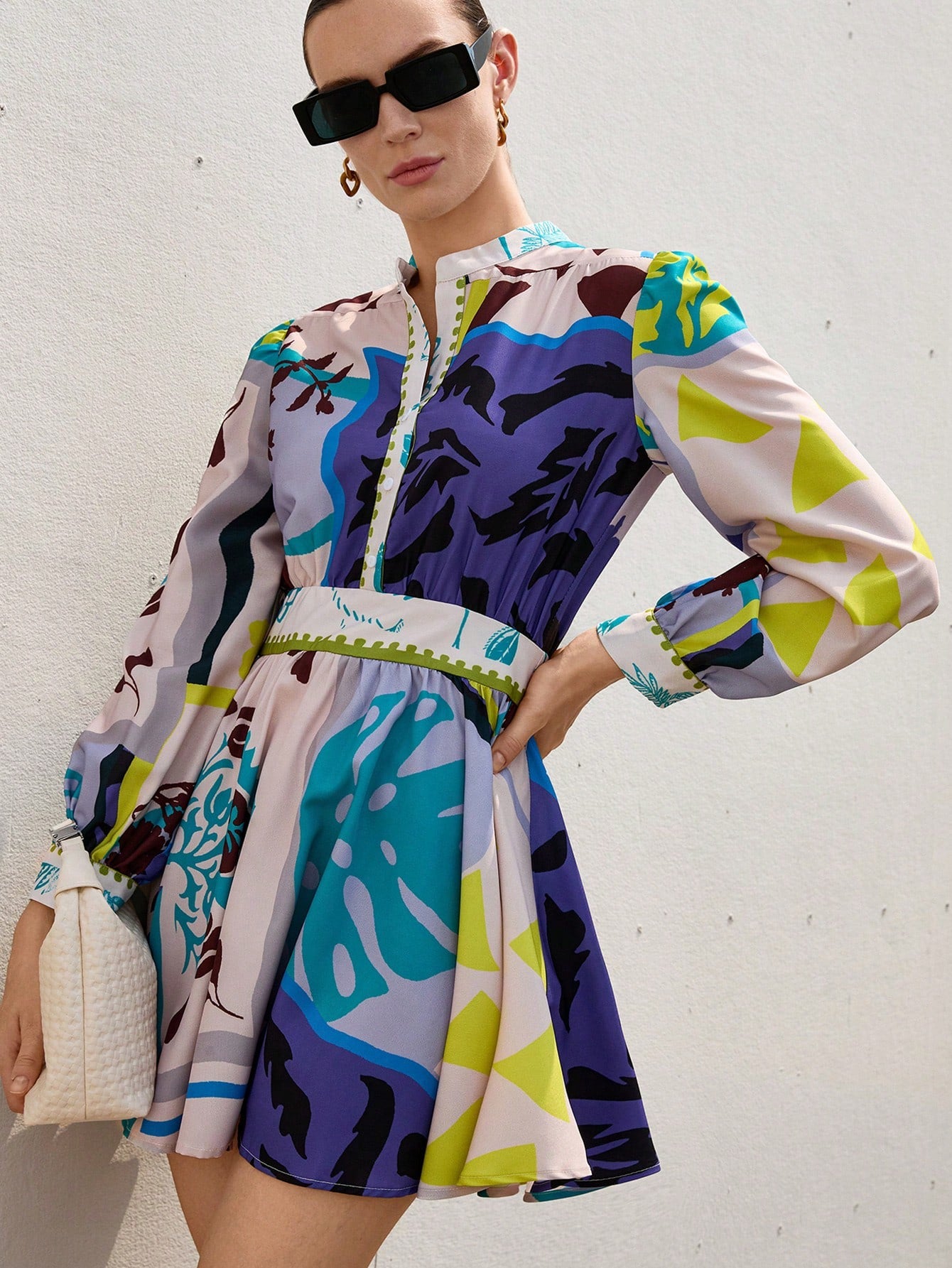 Step into vacation mode with this playful floral print A-line dress! Featuring a flattering V-neck and breezy long sleeves, it’s perfect for sunny strolls or sunset dinners. The short, flirty cut adds a fun twist, making it your go-to for effortless style wherever you wander.