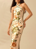Elevate your style with this Chic Floral Print Halter Neck Backless Dress. Featuring an effortlessly elegant design and a unique halter neck, this dress is perfect for any occasion. With a stunning floral print and a backless cut, you'll turn heads wherever you go. Add this dress to your wardrobe for an instant touch of chic and effortless style!