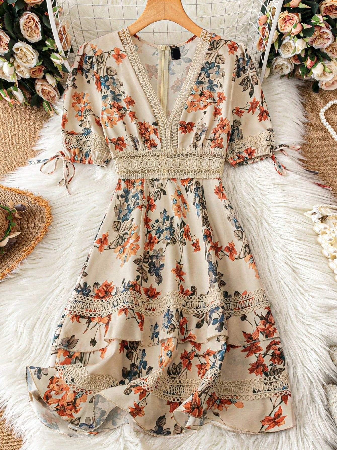 Effortlessly elevate your vacation style with our Chic Floral Print Lace-Trim Casual Dress. Featuring a delicate lace trim and trendy floral print, this dress is the perfect addition to your travel wardrobe. Stay comfortable and stylish while enjoying your vacation.