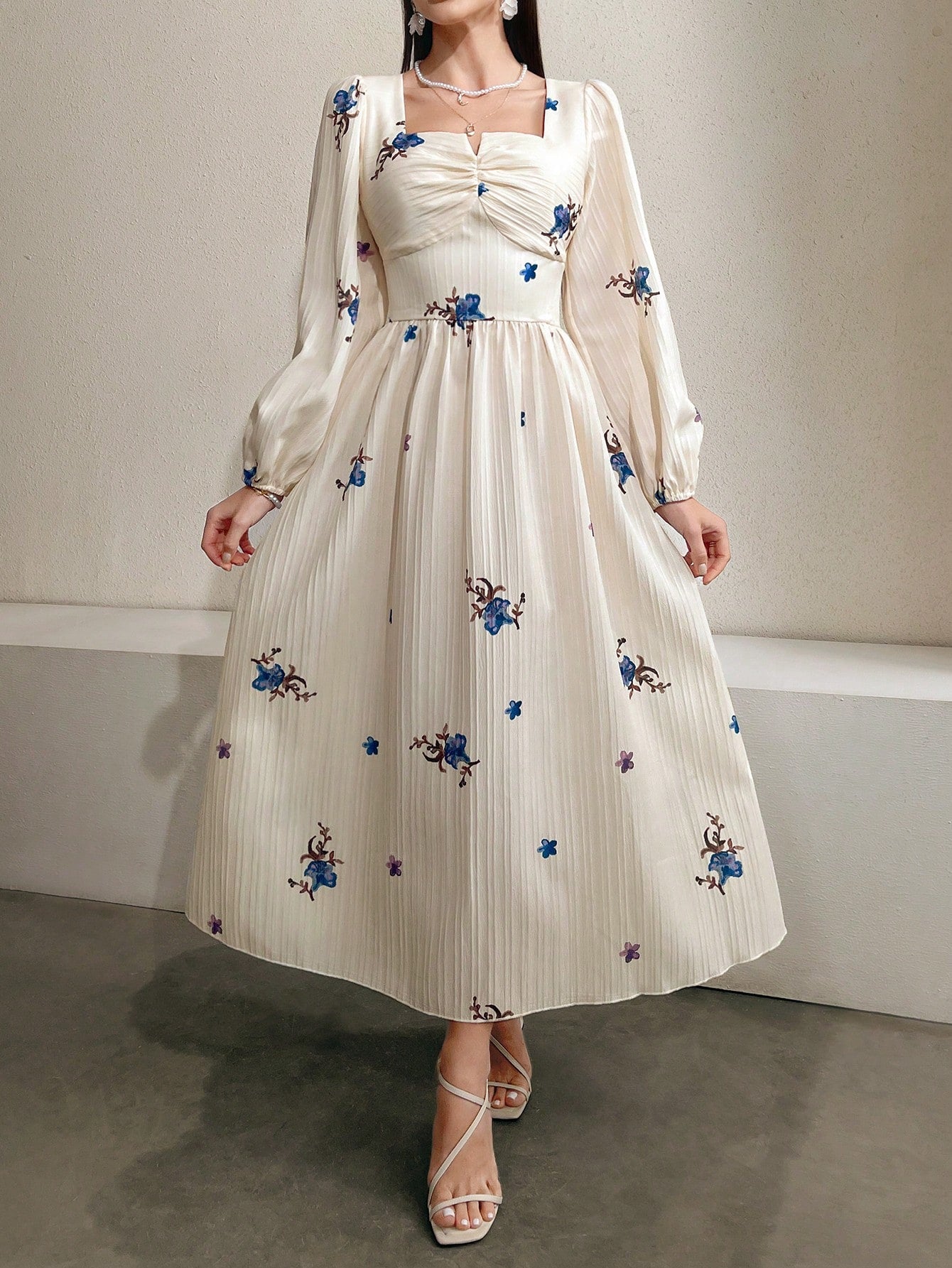 Get ready to turn heads with this elegant maxi dress! Featuring a chic floral print, square neckline, and lantern sleeves, this dress is perfect for any evening occasion. Stay stylish and comfortable while making a statement.