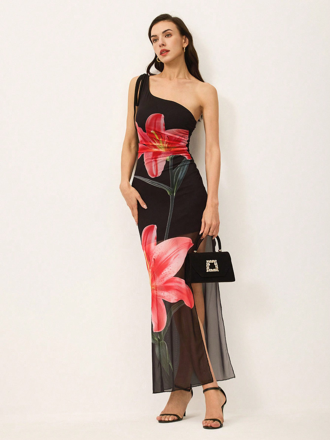 Get ready to turn heads with our Chic Floral Print One-Shoulder Maxi Dress! With its vibrant print and playful one-shoulder design, this dress is perfect for all your summer parties. The side slit adds a touch of sass and makes it easy to dance the night away. Don't miss out on this must-have for your wardrobe!