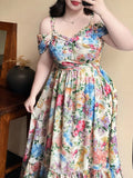 Step into summer with this playful plus size off-shoulder dress, adorned with a vibrant floral print that brings elegance and fun together. Its breezy design keeps you cool while the flattering cut highlights your curves beautifully. Perfect for sunny days and stylish outings, this dress adds a splash of charm to your warm-weather wardrobe.