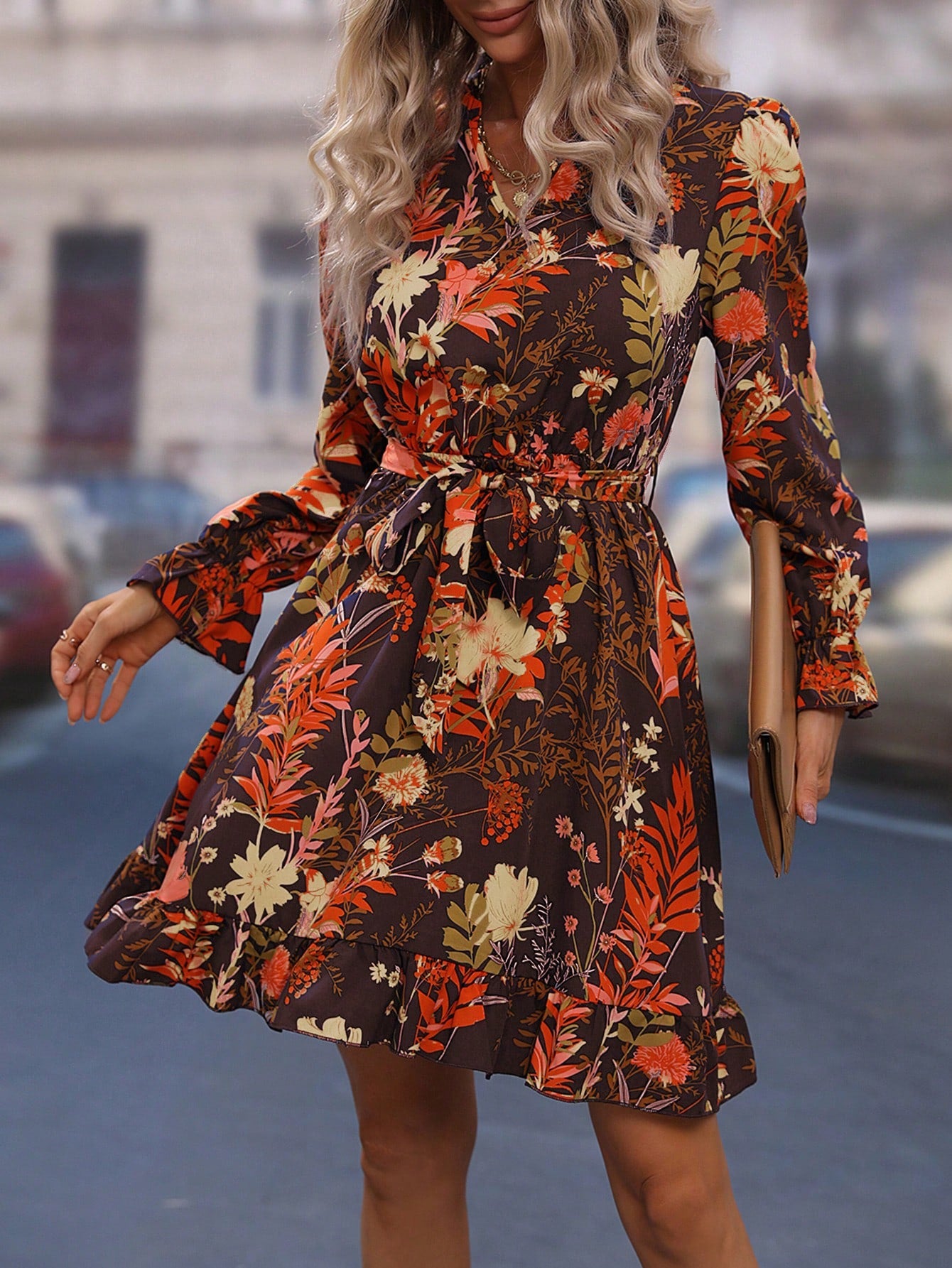 Experience elegance and femininity in our Chic Floral Print Dress. The ruffle hem and flounce sleeves add a touch of sophistication, while the included belt accentuates your waistline. The eye-catching floral print elevates any outfit, making it perfect for any occasion.