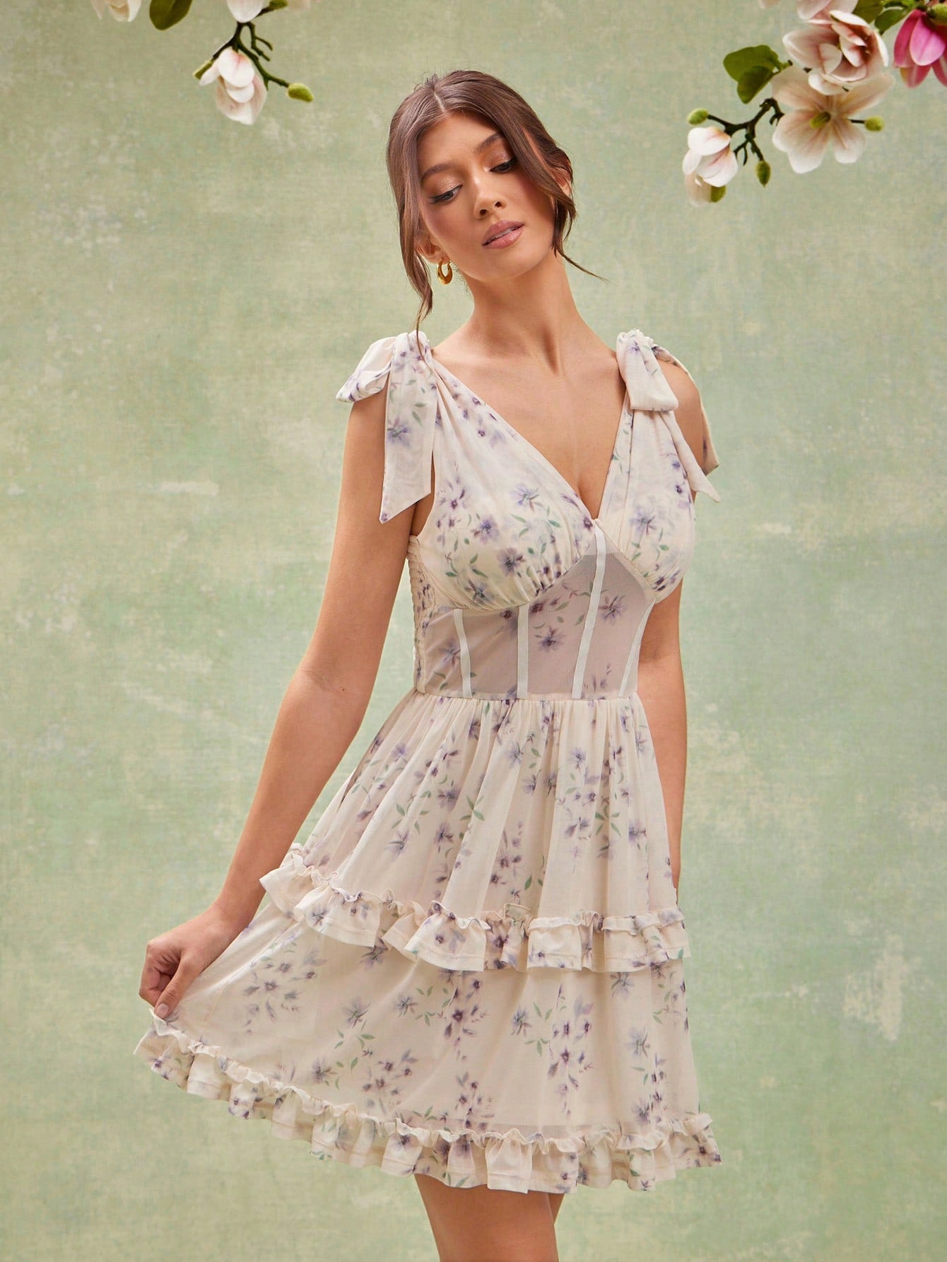 Step into sunny days with this playful sleeveless summer dress, boasting a charming floral print and flirtatious ruffle hem. Lightweight and breezy, it brings effortless style and twirl-ready fun to your warm-weather wardrobe. Perfect for picnics, beach strolls, or casual get-togethers where comfort meets cute.