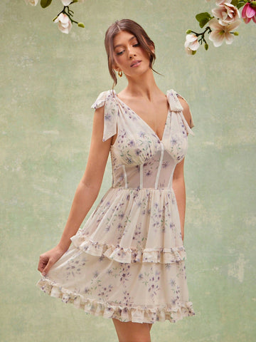 Step into sunny days with this playful sleeveless summer dress, boasting a charming floral print and flirtatious ruffle hem. Lightweight and breezy, it brings effortless style and twirl-ready fun to your warm-weather wardrobe. Perfect for picnics, beach strolls, or casual get-togethers where comfort meets cute.