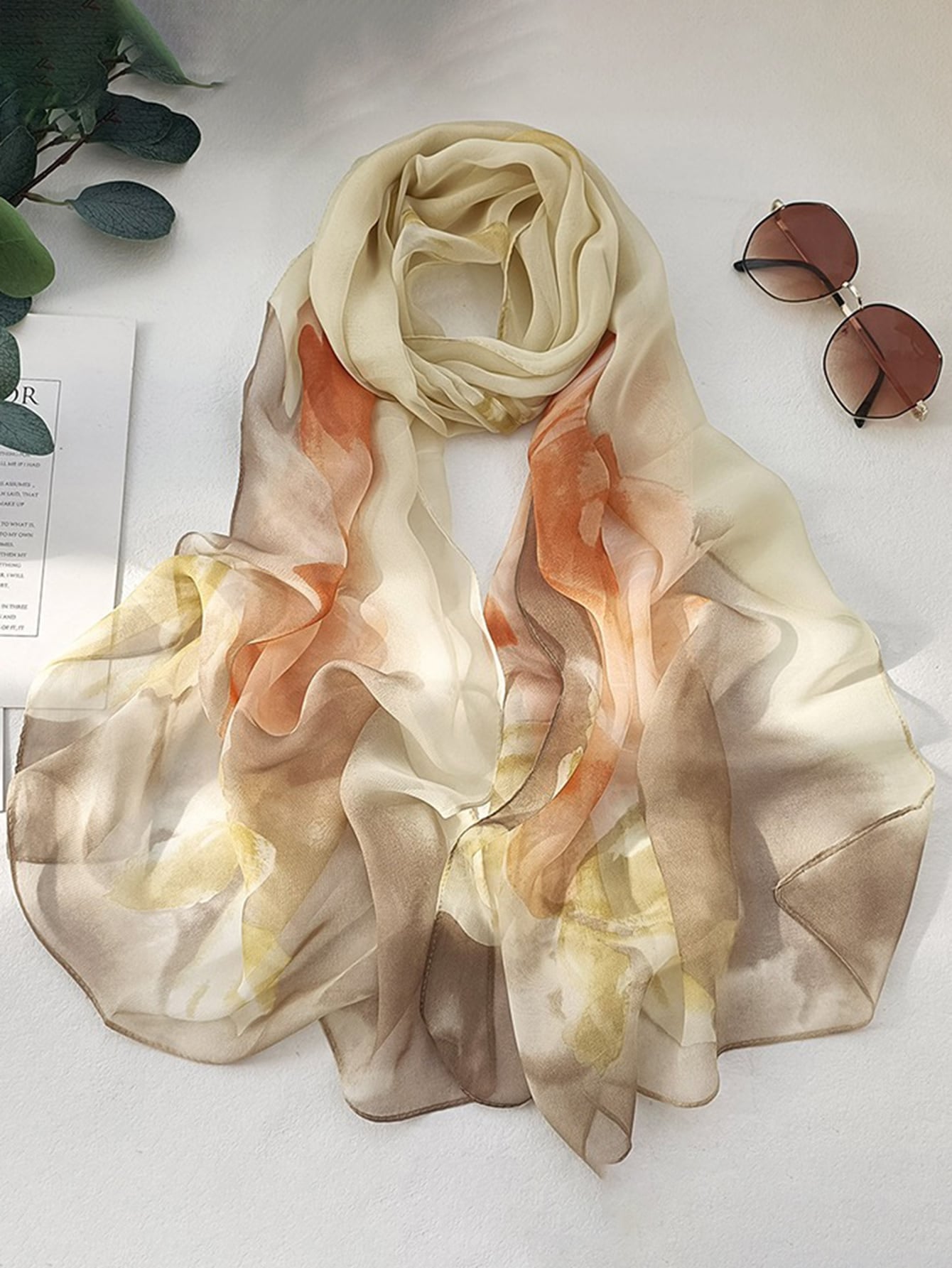This chic floral print scarf is the perfect elegant accessory for all your travel and outdoor adventures. Made with high-quality materials, it offers both style and practicality. Stay stylish and protected from the elements with this versatile boho scarf.