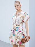 Step into sunshine with this playful floral print shirt dress, designed for effortless vacation vibes. Featuring wide straps for comfort and a self-tie belt to highlight your waist, it’s perfect for casual days exploring or relaxing by the beach. Light, breezy, and full of charm, this dress brings a fresh pop of color to your getaway wardrobe.