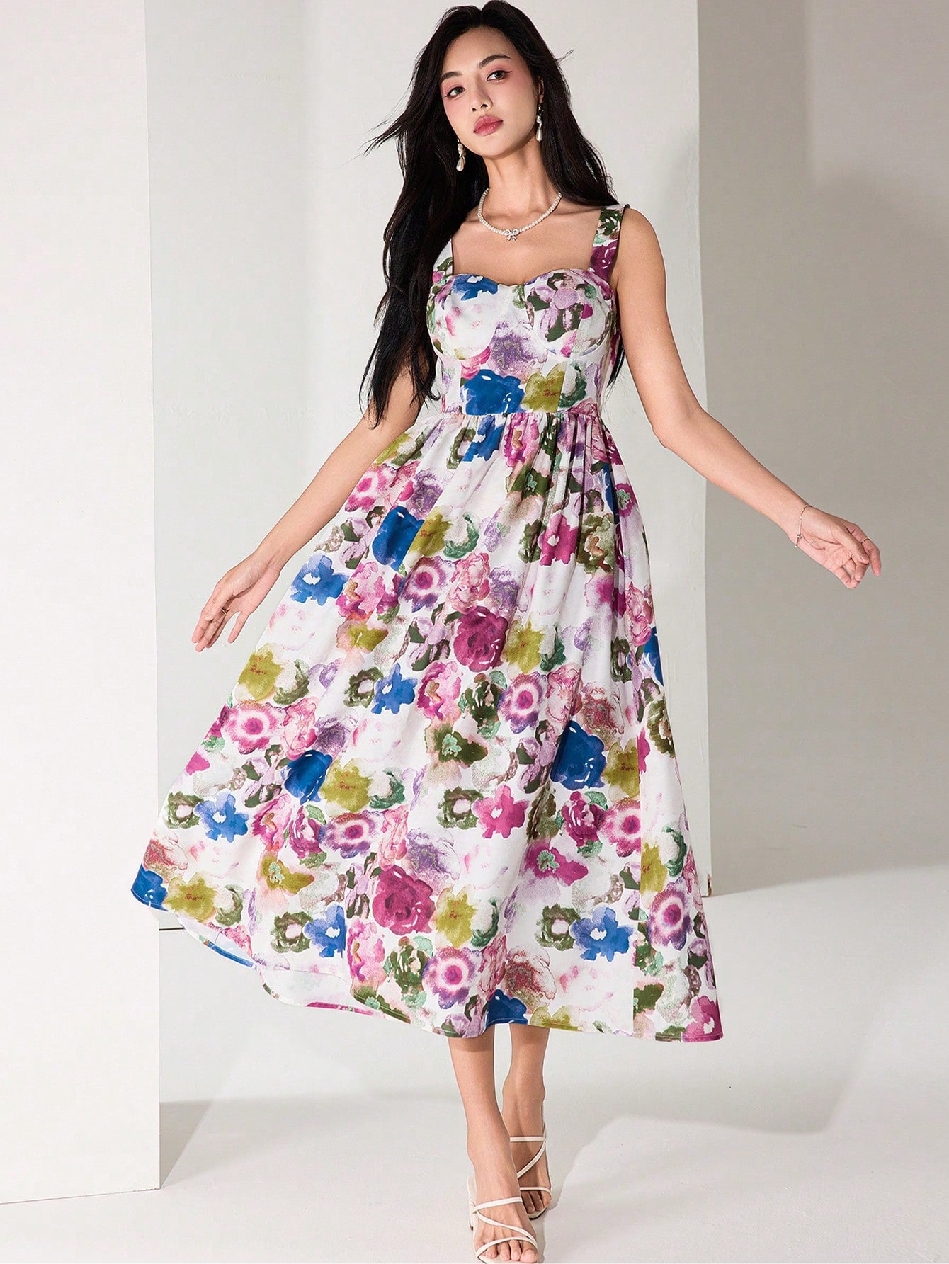 Twirl into summer with this eye-catching floral print sleeveless dress! The flowing length adds drama to your vacation photos, while the sleeveless design keeps you cool during graduation celebrations. Effortlessly chic and ready for compliments, this dress transforms ordinary moments into fabulous memories. Pack it, wear it, love it!