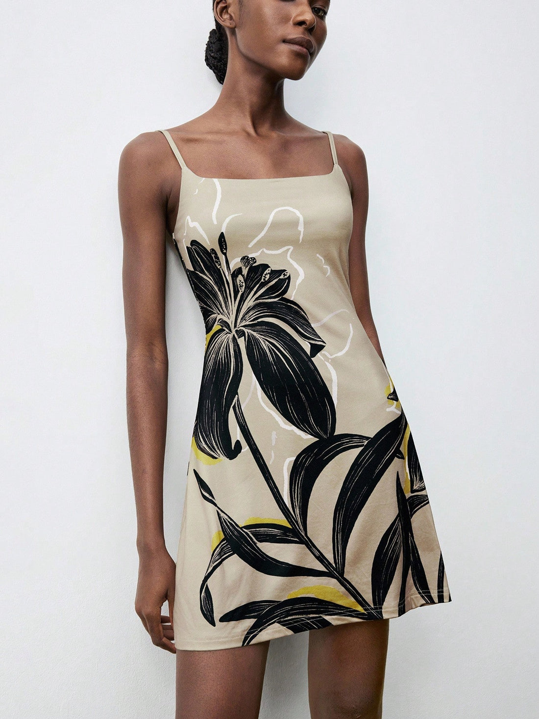 Step out in style with this Chic Floral Print Sleeveless Mini Dress, designed for effortless charm on any outing. Its vibrant floral pattern and breezy sleeveless cut make it perfect for warm days and lively nights. Flirty and fun, this mini dress lets you move freely while turning heads wherever you go. Dress it up with your favorite accessories and get ready to shine!