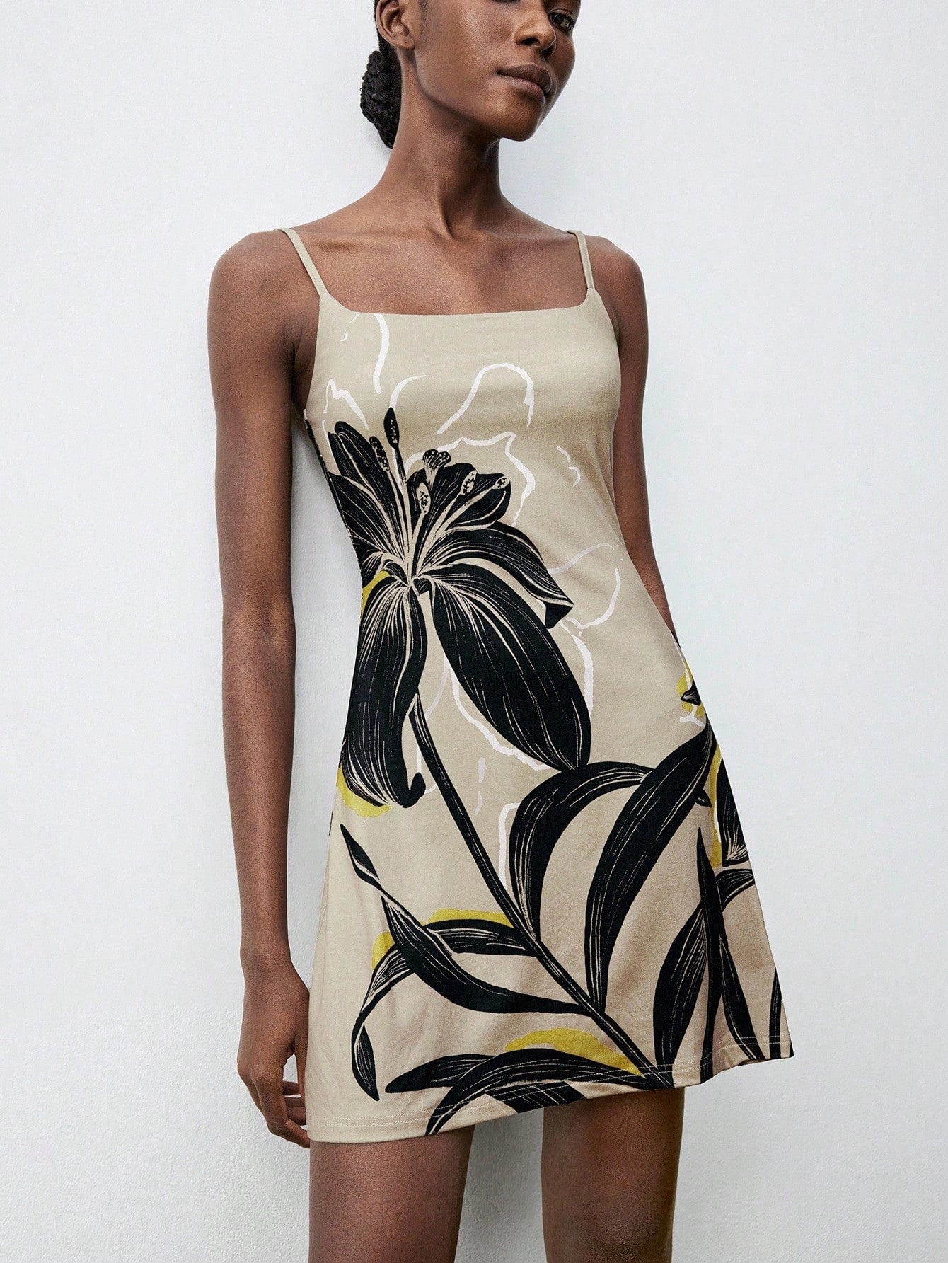 Step out in style with this Chic Floral Print Sleeveless Mini Dress, designed for effortless charm on any outing. Its vibrant floral pattern and breezy sleeveless cut make it perfect for warm days and lively nights. Flirty and fun, this mini dress lets you move freely while turning heads wherever you go. Dress it up with your favorite accessories and get ready to shine!