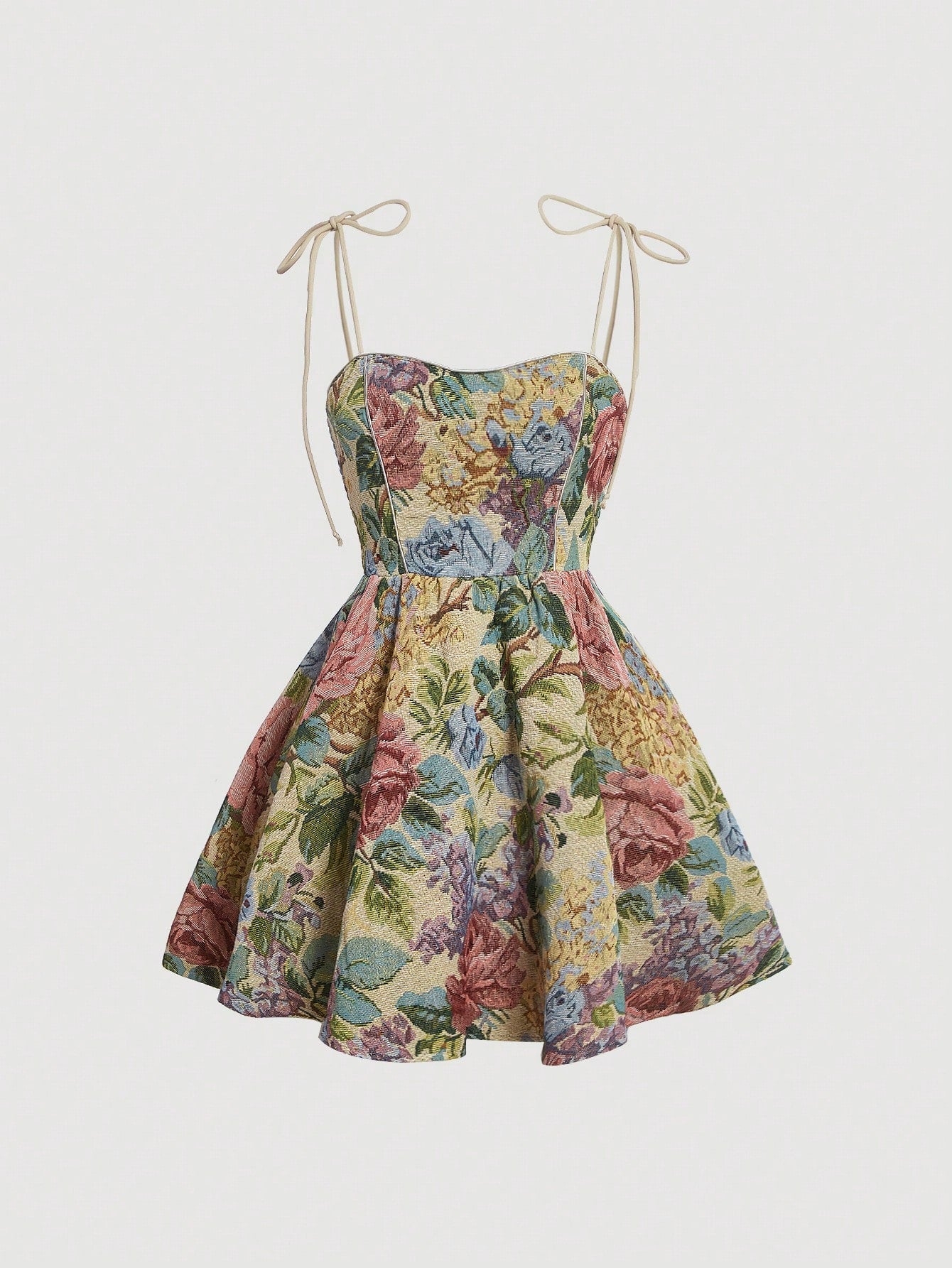 Step into summer with this playful floral print tie-shoulder cami dress. Its delicate tie-shoulder straps add a flirty touch, while the vibrant floral pattern brings effortless elegance to your warm-weather wardrobe. Perfect for sunny days and breezy evenings, this dress combines comfort and style for a look that’s both fun and fabulous.