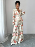 Bloom into style with this stunning floral print two-piece set that's ready to turn heads! The tailored blazer brings polished sophistication to any occasion, while the flowing wide-leg pants offer comfort without compromising on elegance. Perfect for spring strolls or autumn adventures, this ensemble effortlessly transitions from office to brunch to evening plans. The vibrant floral pattern adds a fresh, feminine touch that celebrates your personality. Mix, match, or wear together—this versatile duo is you