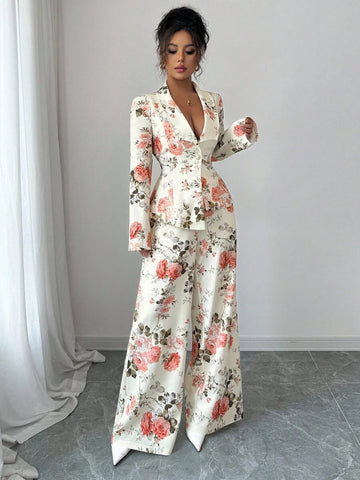 Bloom into style with this stunning floral print two-piece set that's ready to turn heads! The tailored blazer brings polished sophistication to any occasion, while the flowing wide-leg pants offer comfort without compromising on elegance. Perfect for spring strolls or autumn adventures, this ensemble effortlessly transitions from office to brunch to evening plans. The vibrant floral pattern adds a fresh, feminine touch that celebrates your personality. Mix, match, or wear together—this versatile duo is you